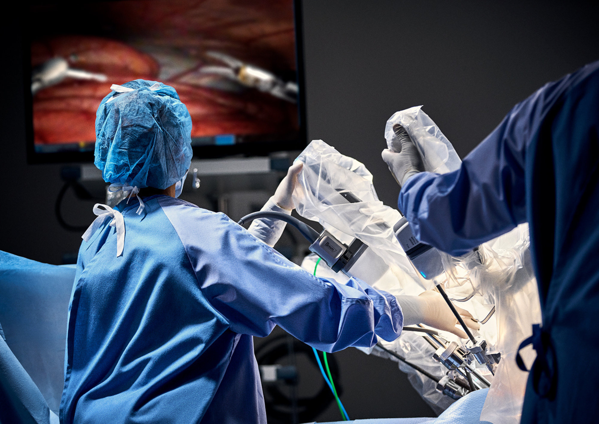 Surgeons operating the Da Vinci xi robotic surgery equipment