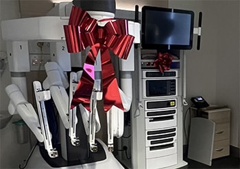 The da Vinci Xi surgical robot with a big red bow after being delivered to St John of God Bendigo Hospital