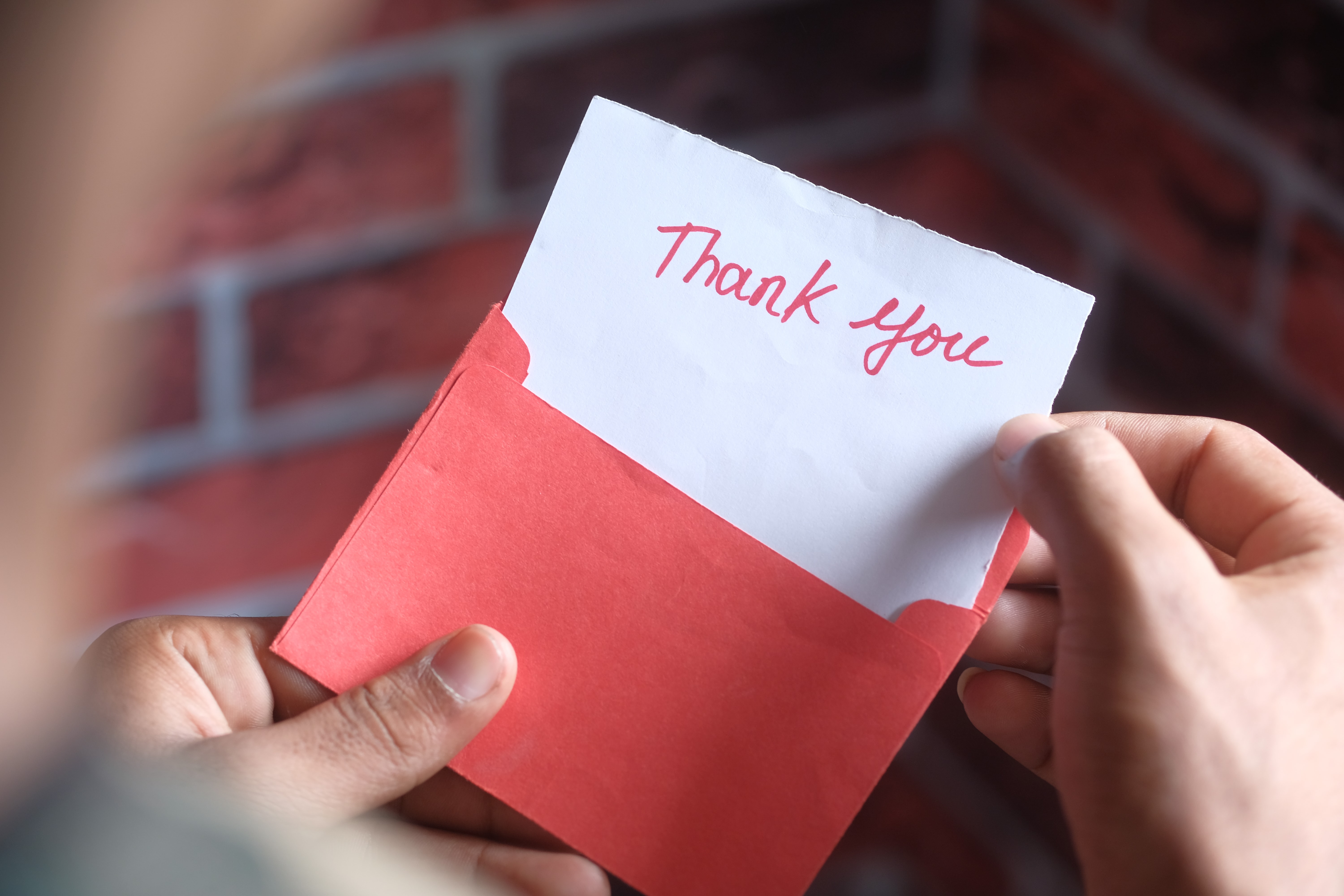 Thank you card in red envelope